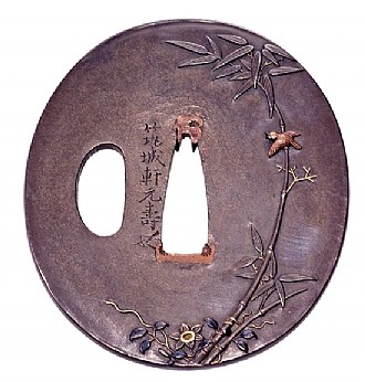 Tsuba (Sword Handguard) 

Bamboo and Flowers 

Signature: Chikujoken Mototoshi, Mito School 

Shibuichi (copper and silver alloy), gold and silver 

Copper and shakudo (copper, bronze and gold alloy) inlay 

Second quarter of the 19th c. 

6.5 x 5.8 cm