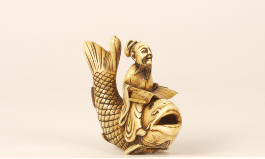 Kinko riding a carpKatabori netsukeIvory, 19th