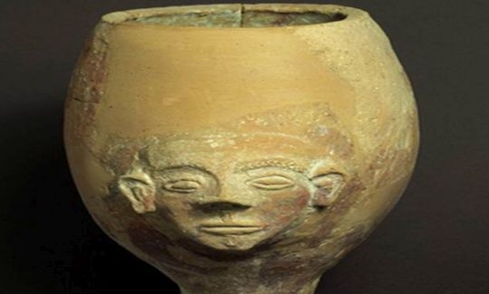 Goblet Painted decoration and moulded human face